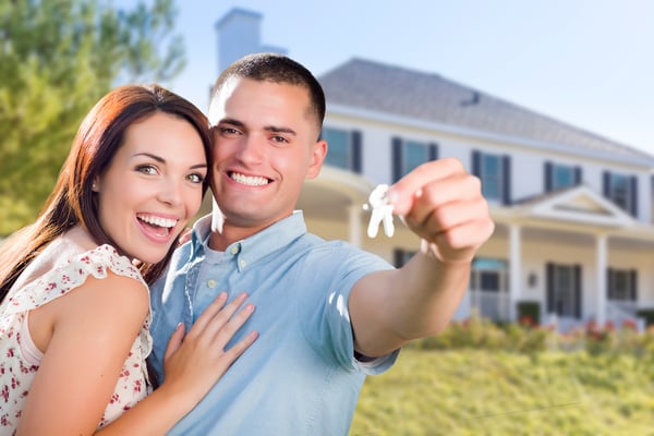 Young happy couple moves into a home for rent in Charleston, SC. 