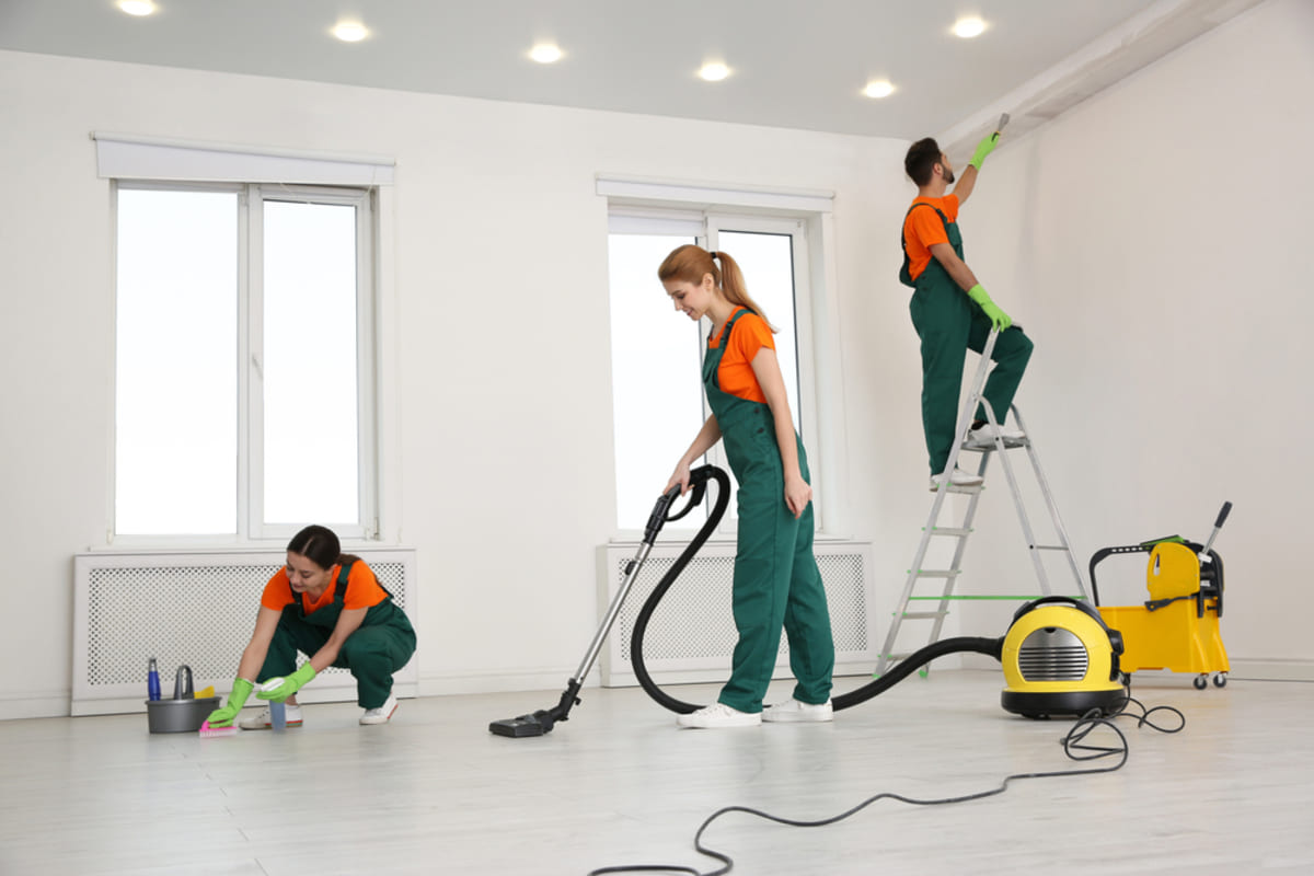 A team of maintenance and cleaning staff getting a room ready, make ready process concept - featured_image